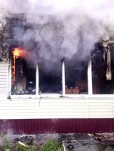 В Вятскополянском районе 14 человек тушили пожар в многоквартирном доме.